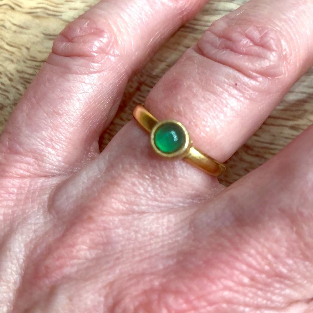 Gold ring with green stone